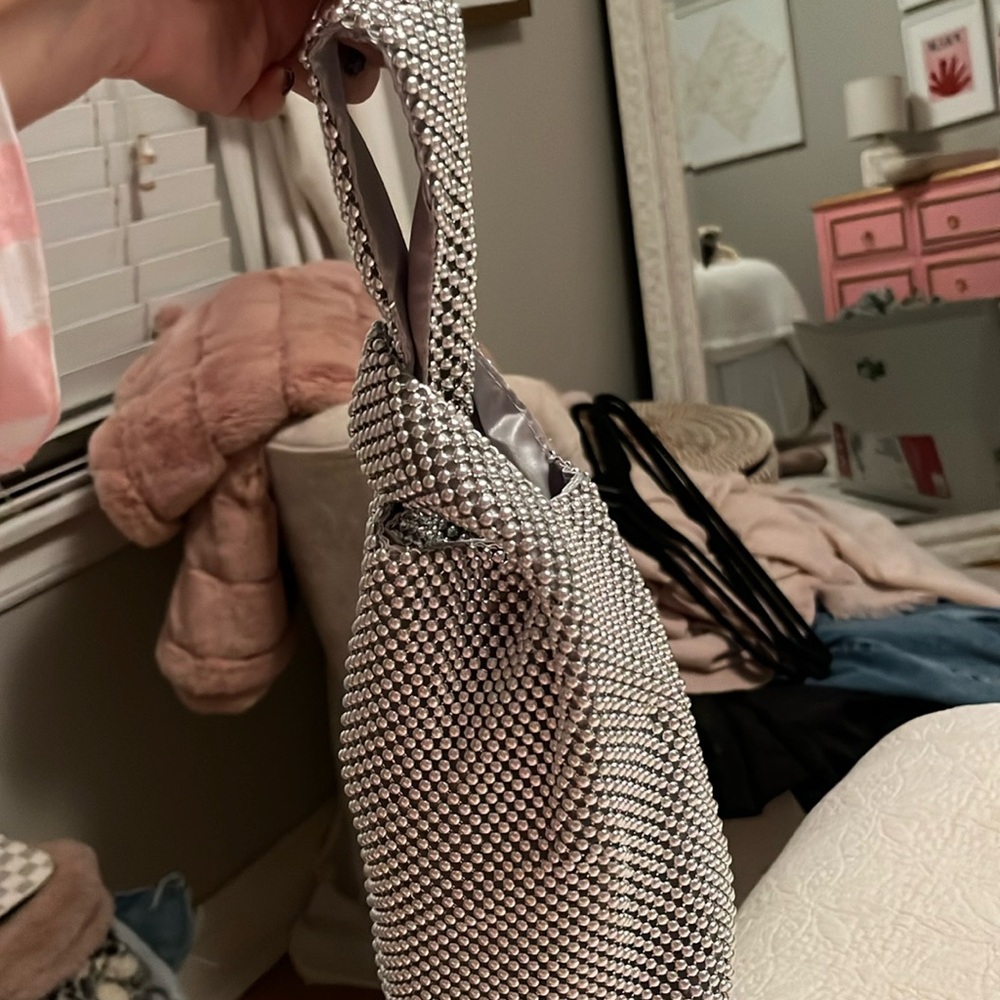 Silver going out purse